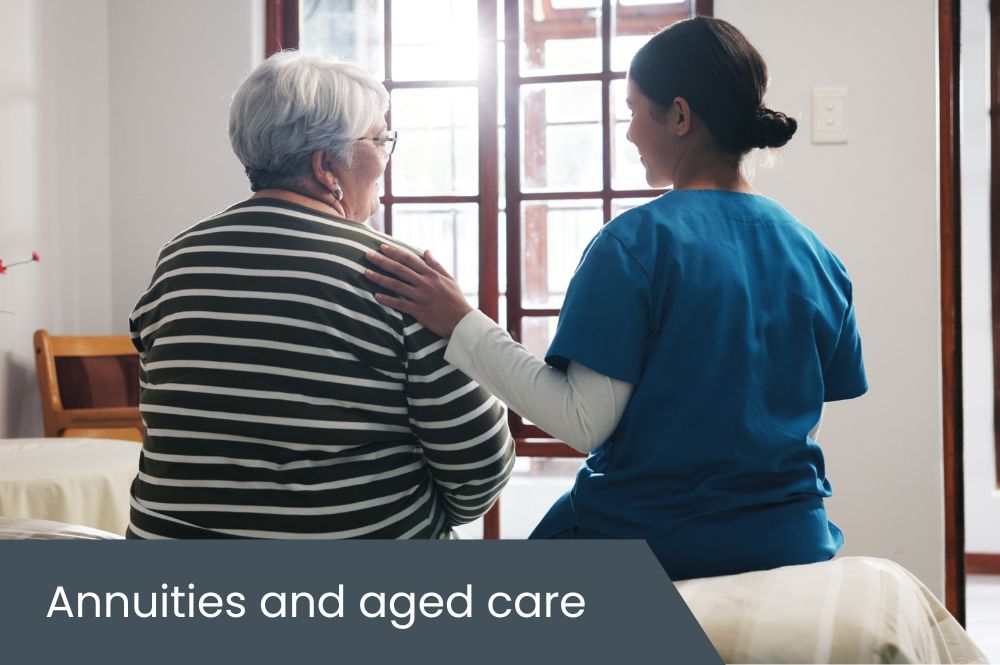Annuities and aged care Elderly aged care resident sitting on bed with support worker