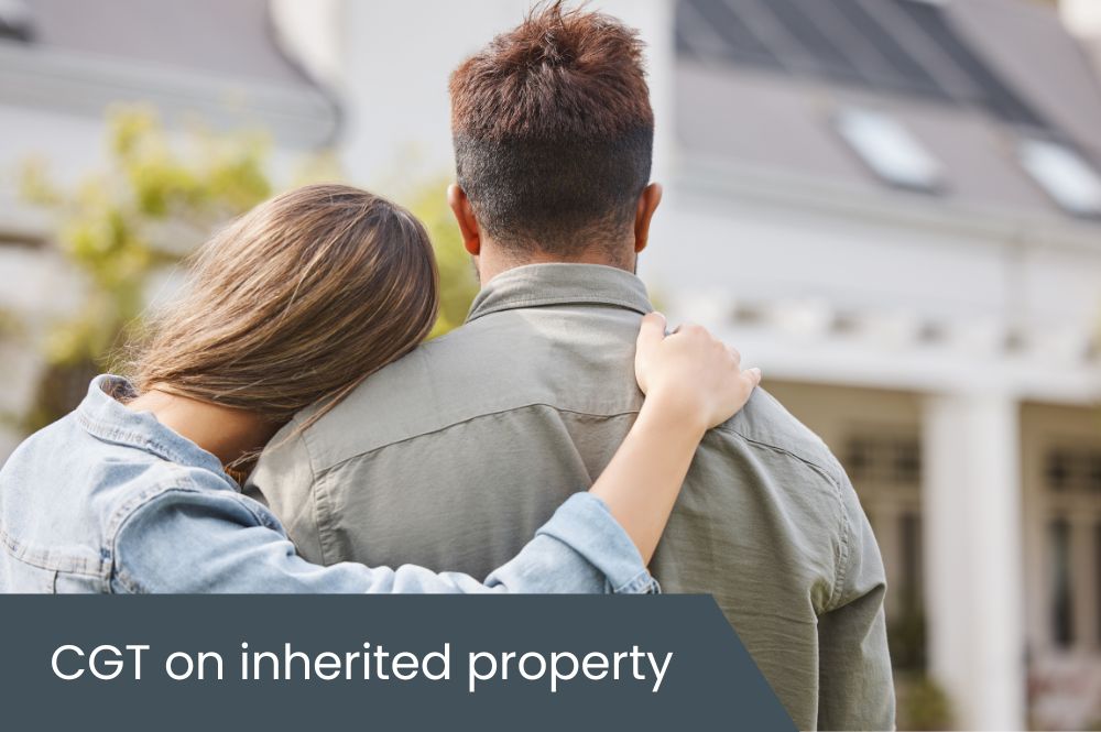 CGT on inherited property Couple standing outside property