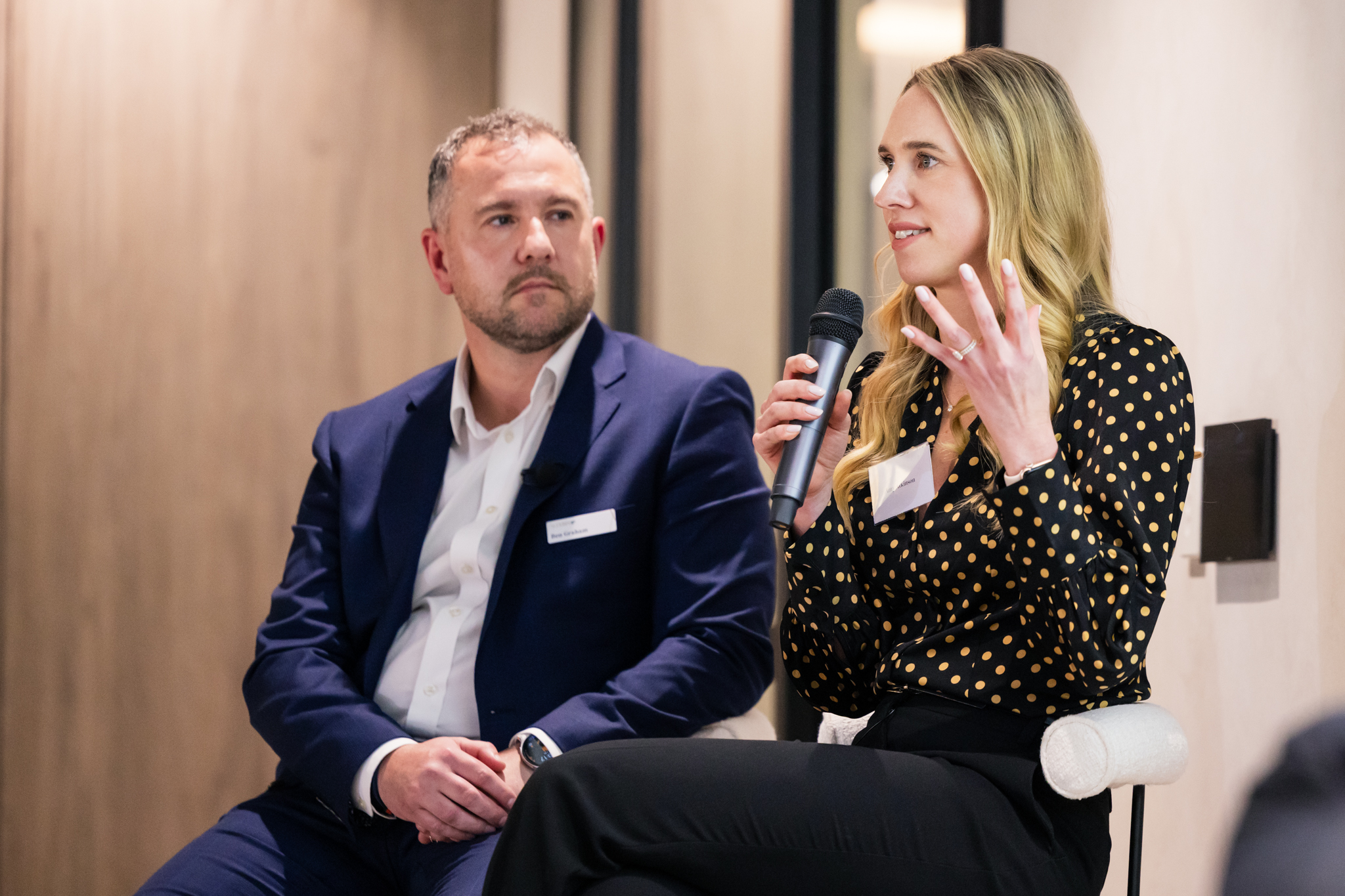 Two speakers at an Alteris Sydney event
