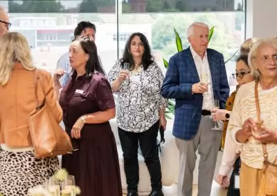 People mingling in room