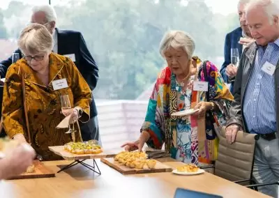 people eating catering at event